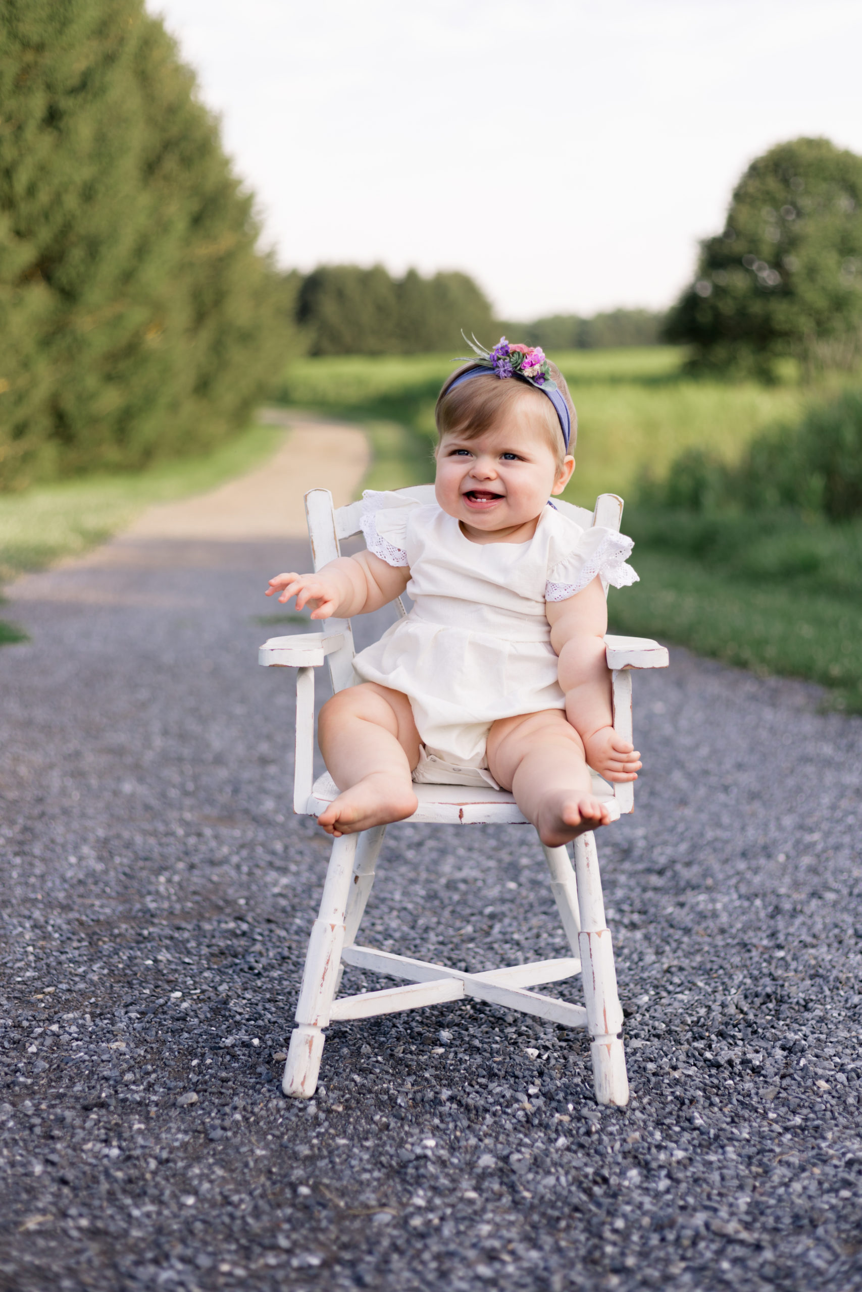 Baby Girl Sitting on a chair