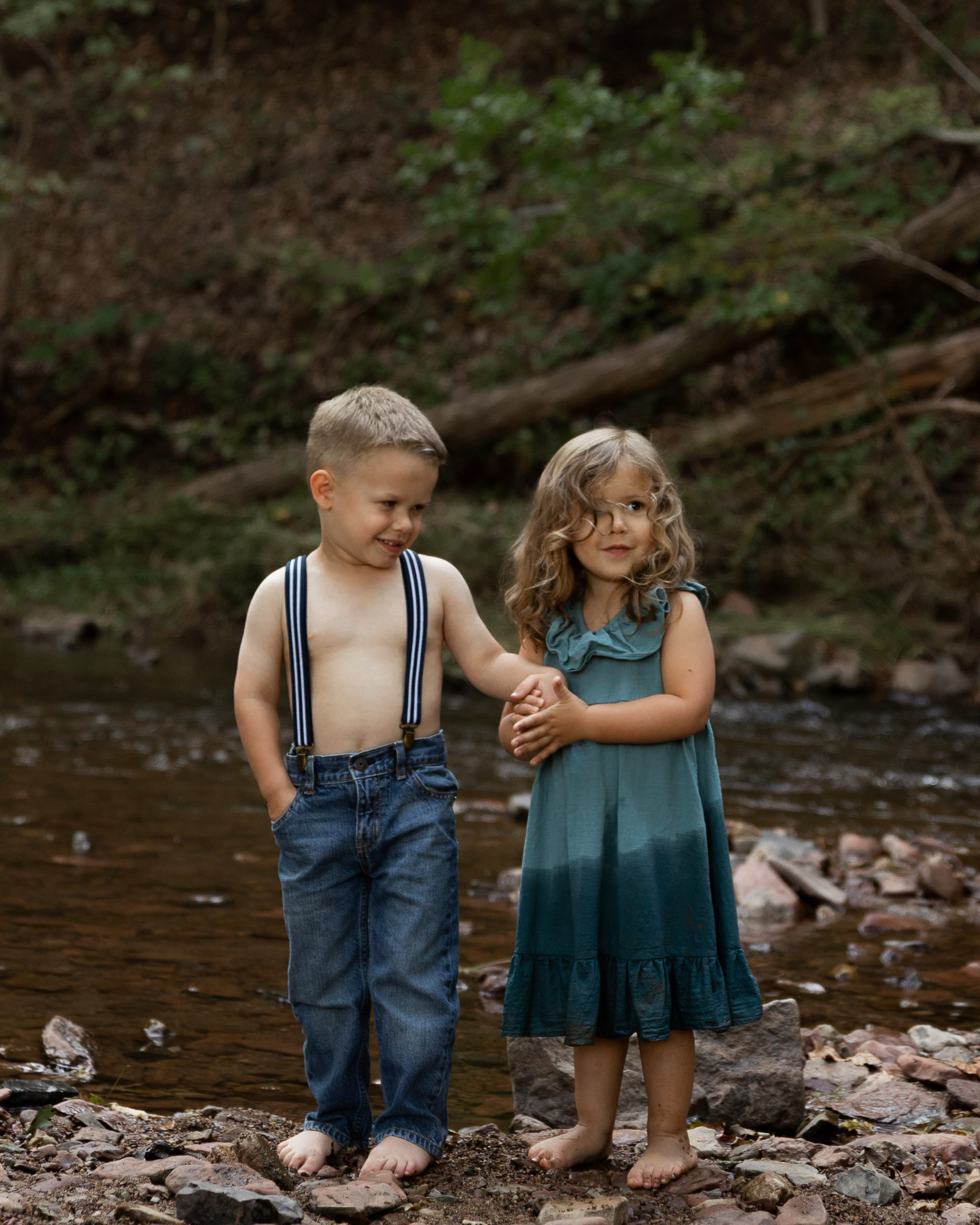 Little boy and girl playing in a creek- ideas forthings to do with kids in Philadelphia